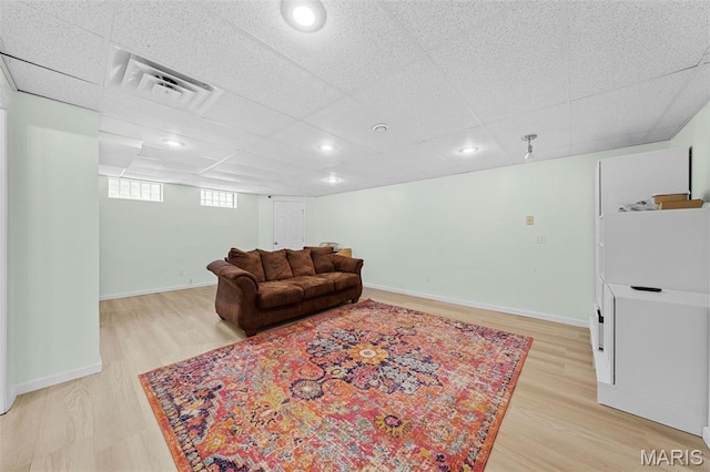 3060 Almond Tree Dr, Saint Peters, MO 63376 - living area featuring light wood finished floors, a drop ceiling, and recessed lighting