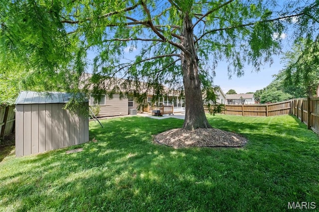 3060 Almond Tree Dr, Saint Peters, MO 63376 - fenced backyard with a storage unit and a patio area