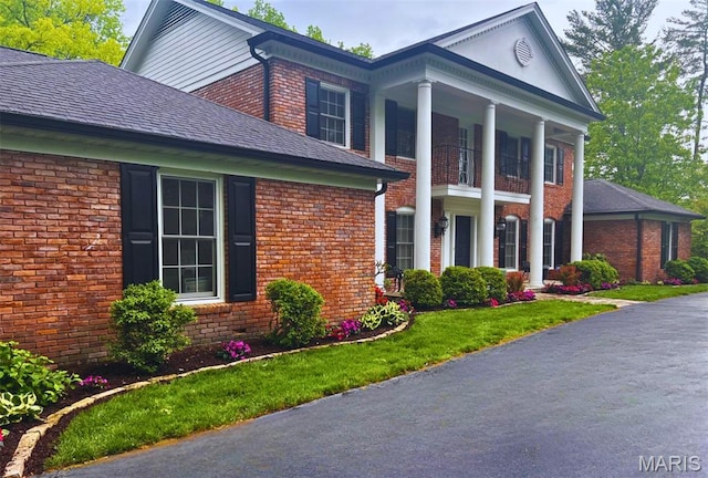 50 Portland Dr, Frontenac, MO 63131 - view of property exterior with brick siding and a shingled roof