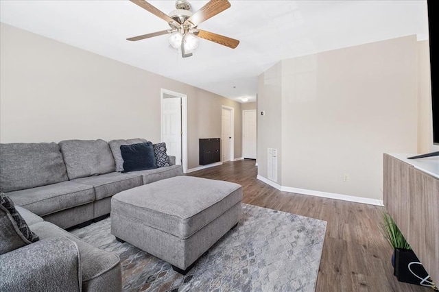 100 Jubilee Hill Dr Unit G, Wildwood, MO 63040 - living area featuring wood finished floors, baseboards, and a ceiling fan