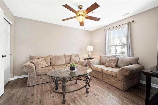 100 Jubilee Hill Dr Unit G, Wildwood, MO 63040 - living room with wood finished floors, a ceiling fan, and baseboards