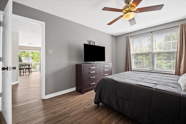 100 Jubilee Hill Dr Unit G, Wildwood, MO 63040 - bedroom with dark wood-type flooring, baseboards, and a ceiling fan