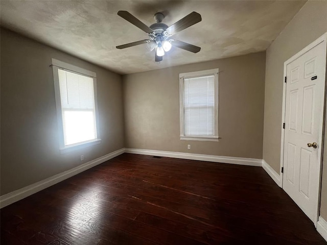 1638 Poplar St, Granite City, IL 62040 - spare room featuring baseboards, hardwood / wood-style flooring, and a ceiling fan
