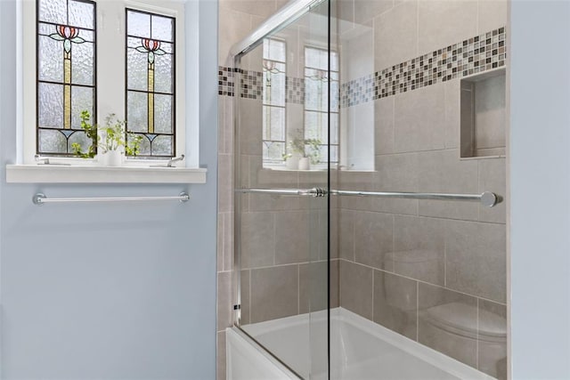 8145 University Dr, Clayton, MO 63105 - bathroom with shower / bath combination with glass door