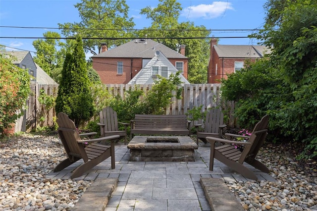 8145 University Dr, Clayton, MO 63105 - view of patio / terrace with a fire pit