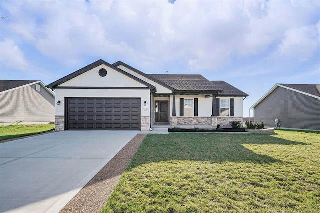 917 Gimli Ln, Wright City, MO 63390 - view of front facade featuring stone siding, a garage, driveway, and a front yard