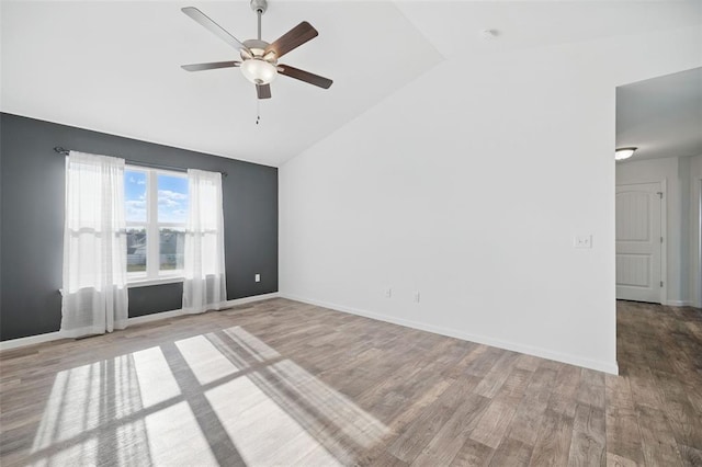 917 Gimli Ln, Wright City, MO 63390 - unfurnished room with lofted ceiling, wood finished floors, ceiling fan, and baseboards
