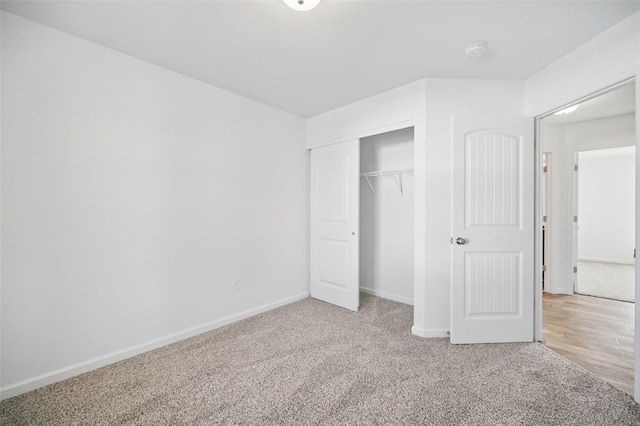 917 Gimli Ln, Wright City, MO 63390 - unfurnished bedroom featuring carpet flooring, baseboards, and a closet