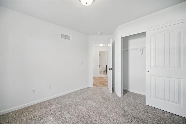 917 Gimli Ln, Wright City, MO 63390 - unfurnished bedroom with carpet flooring, baseboards, and a closet
