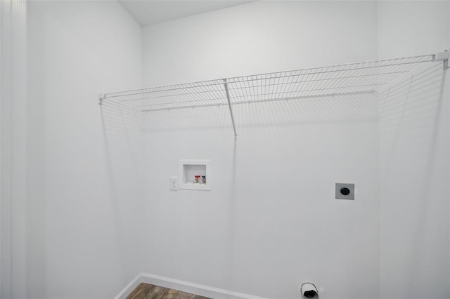 917 Gimli Ln, Wright City, MO 63390 - laundry area with hookup for an electric dryer, hookup for a washing machine, dark wood finished floors, and baseboards