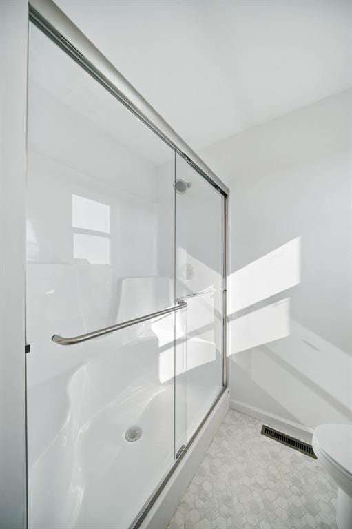 917 Gimli Ln, Wright City, MO 63390 - bathroom with a shower stall and toilet
