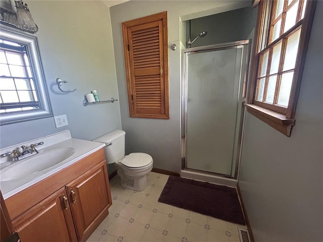 2 Graham Dr, Union, MO 63084 - bathroom featuring a shower stall, vanity, tile patterned floors, and toilet