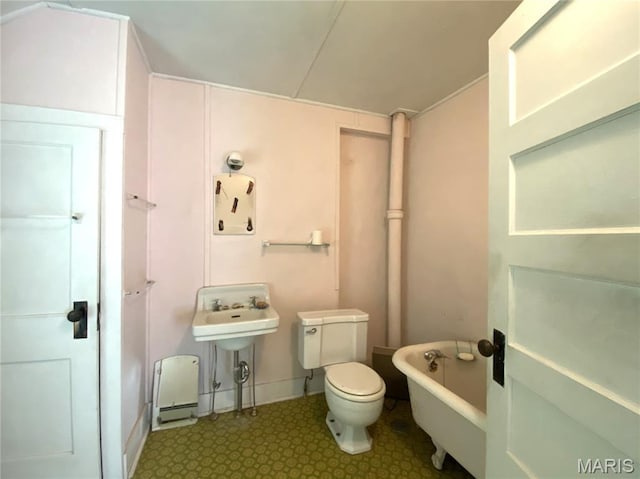 405 W 18th St, Hermann, MO 65041 - full bathroom featuring a soaking tub and toilet