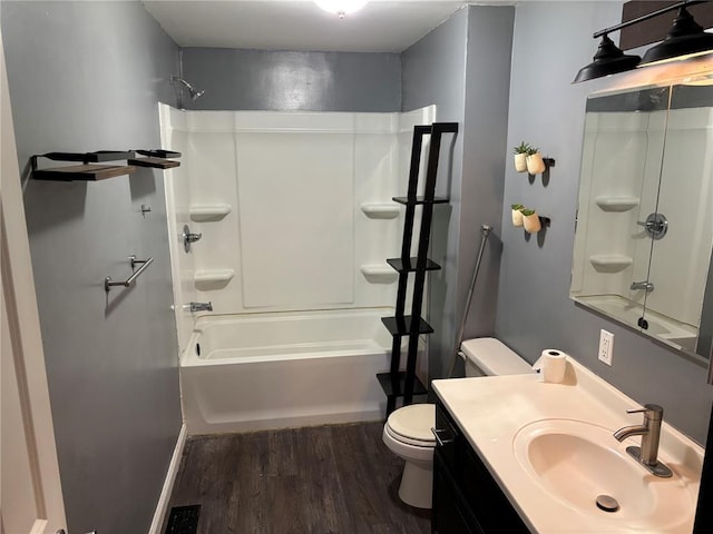 603 Capps Ave, Nokomis, IL 62075 - full bath with wood finished floors, toilet,  shower combination, and vanity