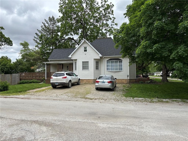 603 Capps Ave, Nokomis, IL 62075 - view of front of home featuring a shingled roof and asphalt driveway