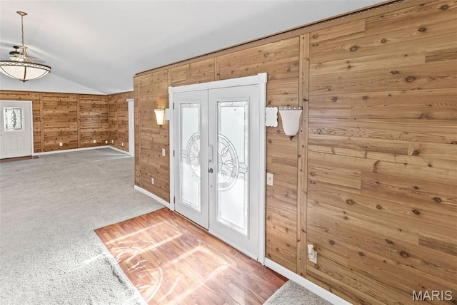 21604 Fox Dr, Carlyle, IL 62231 - entrance foyer with vaulted ceiling, wooden walls, and french doors