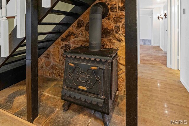21604 Fox Dr, Carlyle, IL 62231 - detailed view of wood finished floors and a wood stove