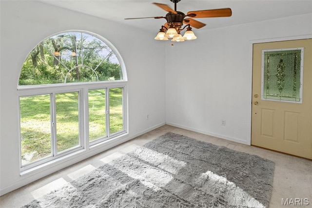 21604 Fox Dr, Carlyle, IL 62231 - carpeted spare room with a ceiling fan and baseboards