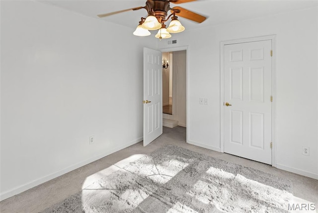 21604 Fox Dr, Carlyle, IL 62231 - unfurnished bedroom with carpet floors and ceiling fan