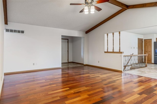 1101 Claycrest Dr, Cottleville Township, MO 63304 - spare room featuring ceiling fan, wood finished floors, beam ceiling, baseboards, and high vaulted ceiling