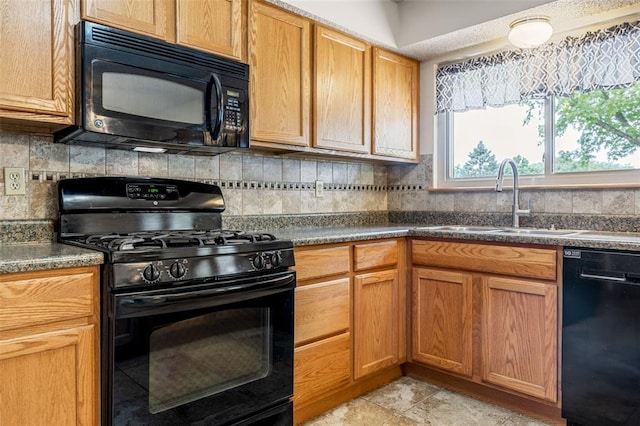 1101 Claycrest Dr, Cottleville Township, MO 63304 - kitchen featuring black appliances, a sink, decorative backsplash, dark countertops, and brown cabinetry