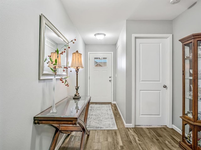 726 Pheasant Run, Waterloo, IL 62298 - foyer entrance with wood finished floors and baseboards
