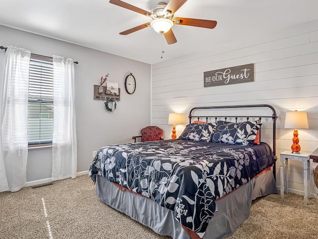 726 Pheasant Run, Waterloo, IL 62298 - bedroom featuring carpet flooring, wooden walls, baseboards, and ceiling fan