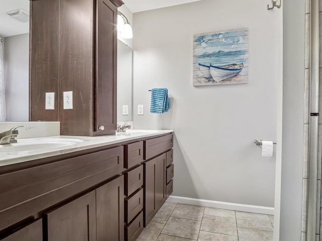 726 Pheasant Run, Waterloo, IL 62298 - bathroom with baseboards, double vanity, and tile patterned floors