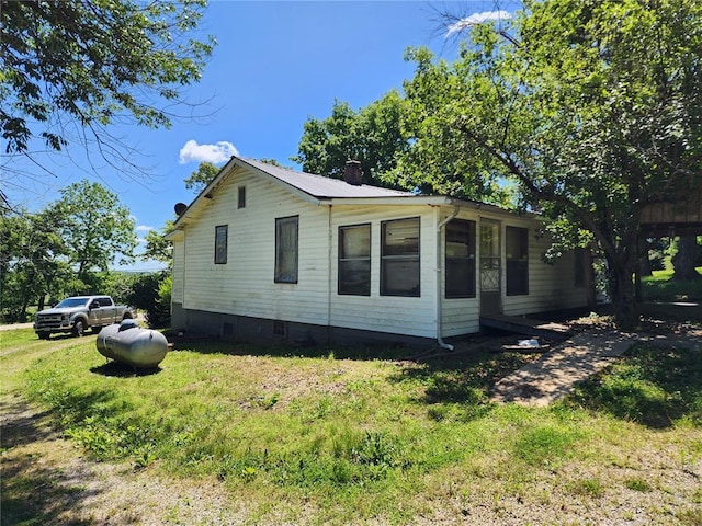 10809 Wayne Route Ff, Patterson, MO 63956 - view of property exterior with a chimney and a yard