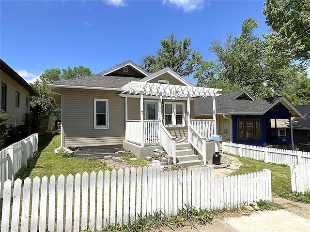 1509 Booker St, Hannibal, MO 63401 - view of front facade featuring a pergola and roof with shingles