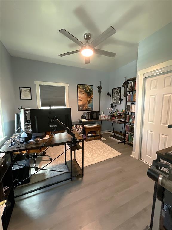 1509 Booker St, Hannibal, MO 63401 - office area with ceiling fan and wood finished floors