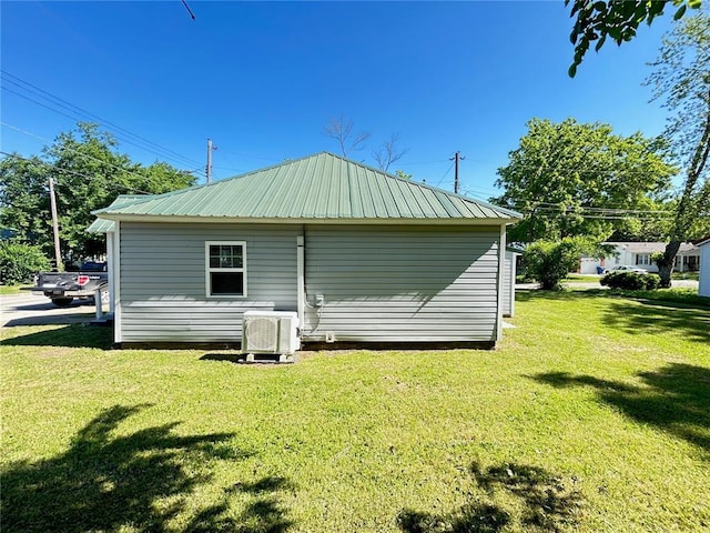 500 S Warfel St, Salem, MO 65560 - back of house with a yard, metal roof, and ac unit