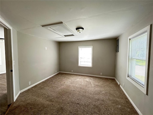 500 S Warfel St, Salem, MO 65560 - carpeted empty room featuring attic access and baseboards