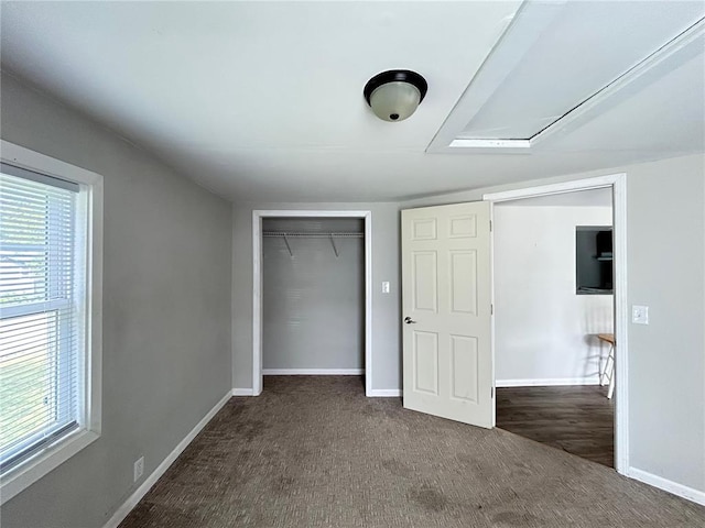 500 S Warfel St, Salem, MO 65560 - unfurnished bedroom with carpet, baseboards, multiple windows, and a closet