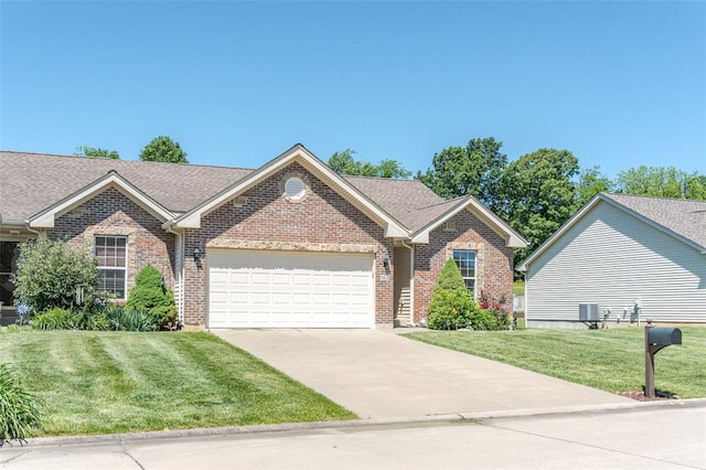 983 Fairway Dr, Union, MO 63084 - view of front of property featuring an attached garage, brick siding, a front yard, and concrete driveway