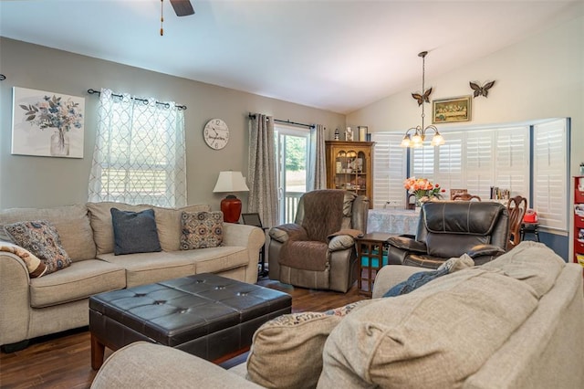 983 Fairway Dr, Union, MO 63084 - living area featuring a chandelier, dark wood-type flooring, vaulted ceiling, and a ceiling fan