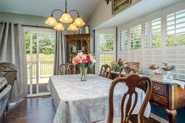 983 Fairway Dr, Union, MO 63084 - dining area featuring a chandelier, wood finished floors, and lofted ceiling