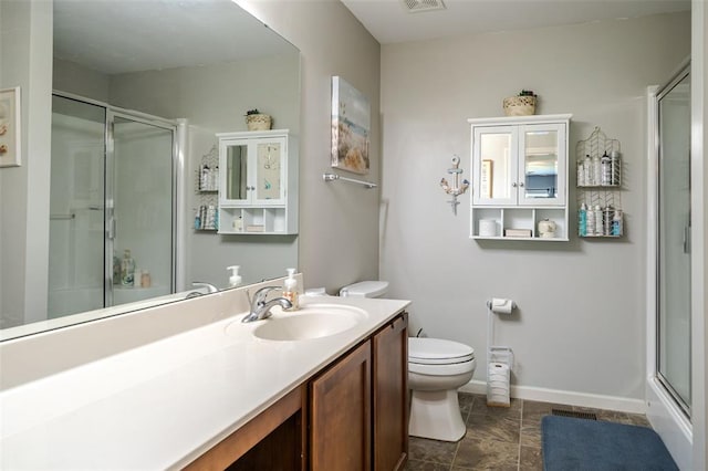 983 Fairway Dr, Union, MO 63084 - full bathroom featuring a shower with door, toilet, vanity, and baseboards