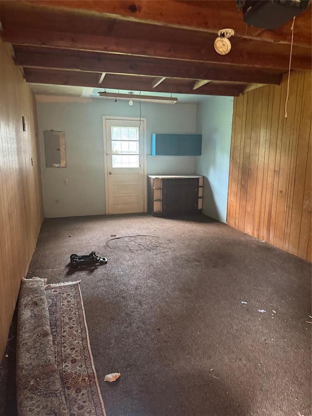 301 S Elm St, Malden, MO 63863 - unfurnished room with electric panel, wood walls, and carpet