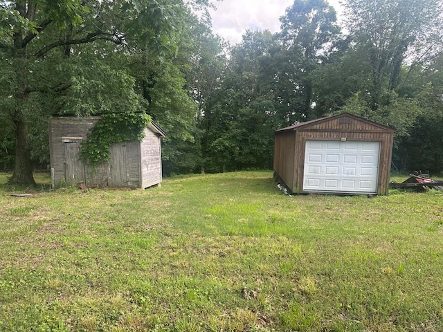 16439 State Highway Af, Dexter, MO 63841 - view of green lawn featuring a detached garage