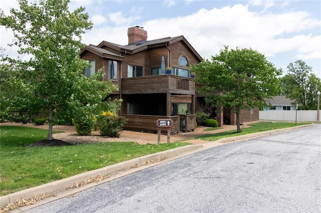 1001 Hemingway Ln Unit H, Weldon Spring, MO 63304 - view of front of house with a chimney and a balcony