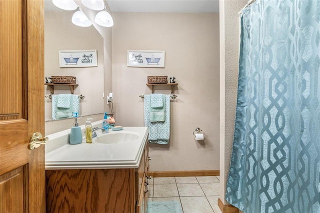 1308 Maggie Cir, Bonne Terre, MO 63628 - bathroom with vanity, tile patterned flooring, baseboards, and a shower with shower curtain