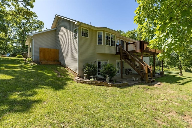 1308 Maggie Cir, Bonne Terre, MO 63628 - rear view of house featuring a deck, a yard, and stairs