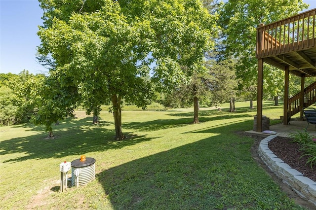 1308 Maggie Cir, Bonne Terre, MO 63628 - view of grassy yard featuring a wooden deck and stairs
