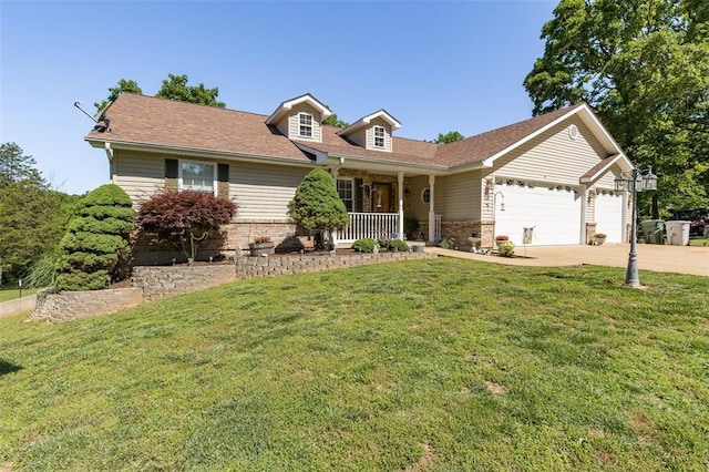 1308 Maggie Cir, Bonne Terre, MO 63628 - view of front facade featuring covered porch, an attached garage, driveway, and a front lawn