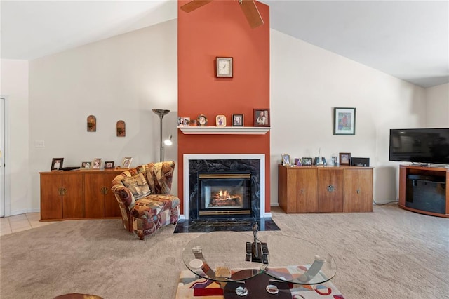 4501 Eli Dr I, Unit I, MO 63128 - carpeted living area with a fireplace, high vaulted ceiling, and baseboards