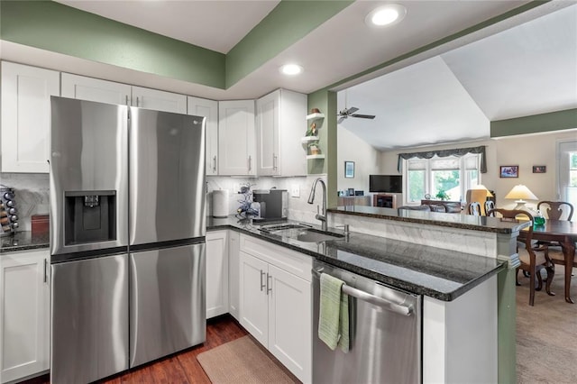4501 Eli Dr I, Unit I, MO 63128 - kitchen featuring stainless steel appliances, a peninsula, a sink, white cabinets, and recessed lighting