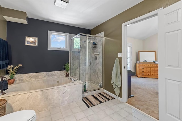 4501 Eli Dr I, Unit I, MO 63128 - bathroom featuring a bath, a shower stall, and toilet