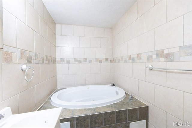 11230 W Little Oaks Rd, Rolla, MO 65401 - bathroom featuring tile walls and a whirlpool tub