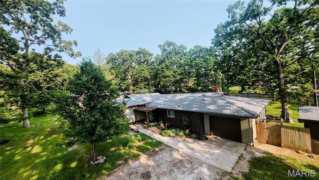 11230 W Little Oaks Rd, Rolla, MO 65401 - ranch-style home with a garage, driveway, and a chimney